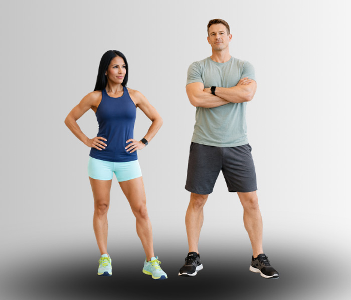 Athletic couple standing next to each other